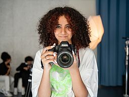 Mädchen mit Kamera