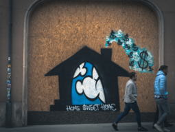 Graffiti mit Haus & das Geld fliegt beim Schornstein hinaus